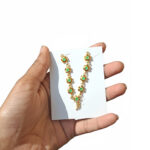 Handcrafted Gold-Plated Thakurji Mala with Emerald Green Stone Accents - Image 5
